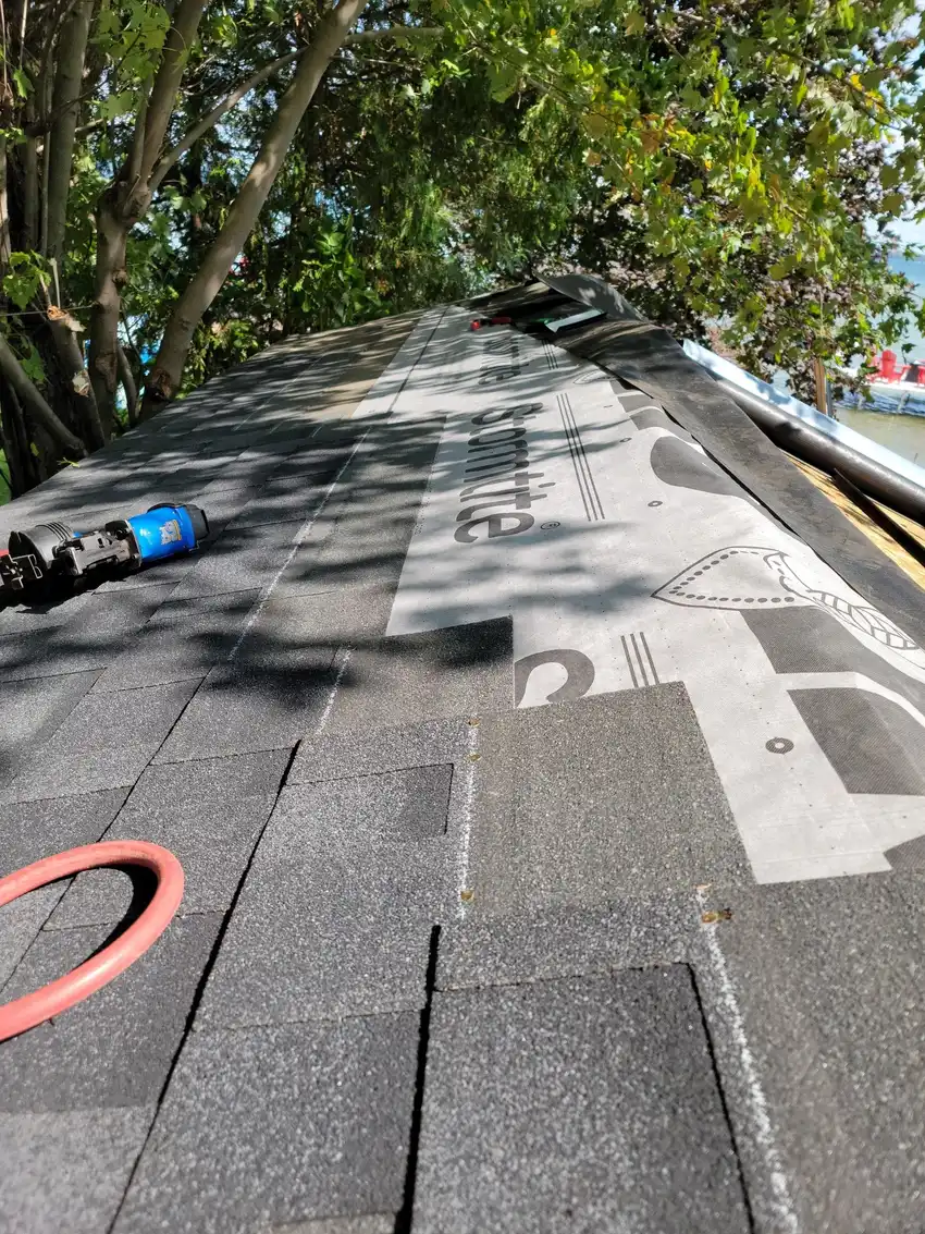 A roof replacement in progress by Ready Roofing & Renovations.