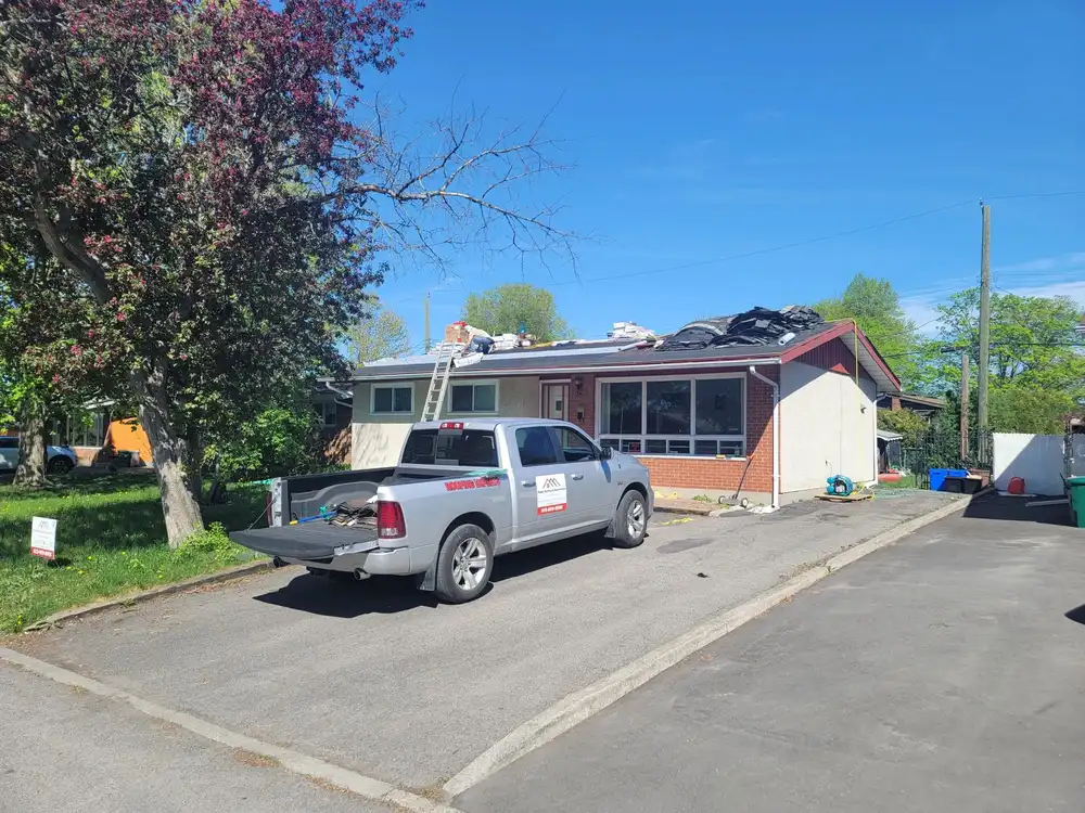 A finished roofing job by Ready Roofing & Renovations.